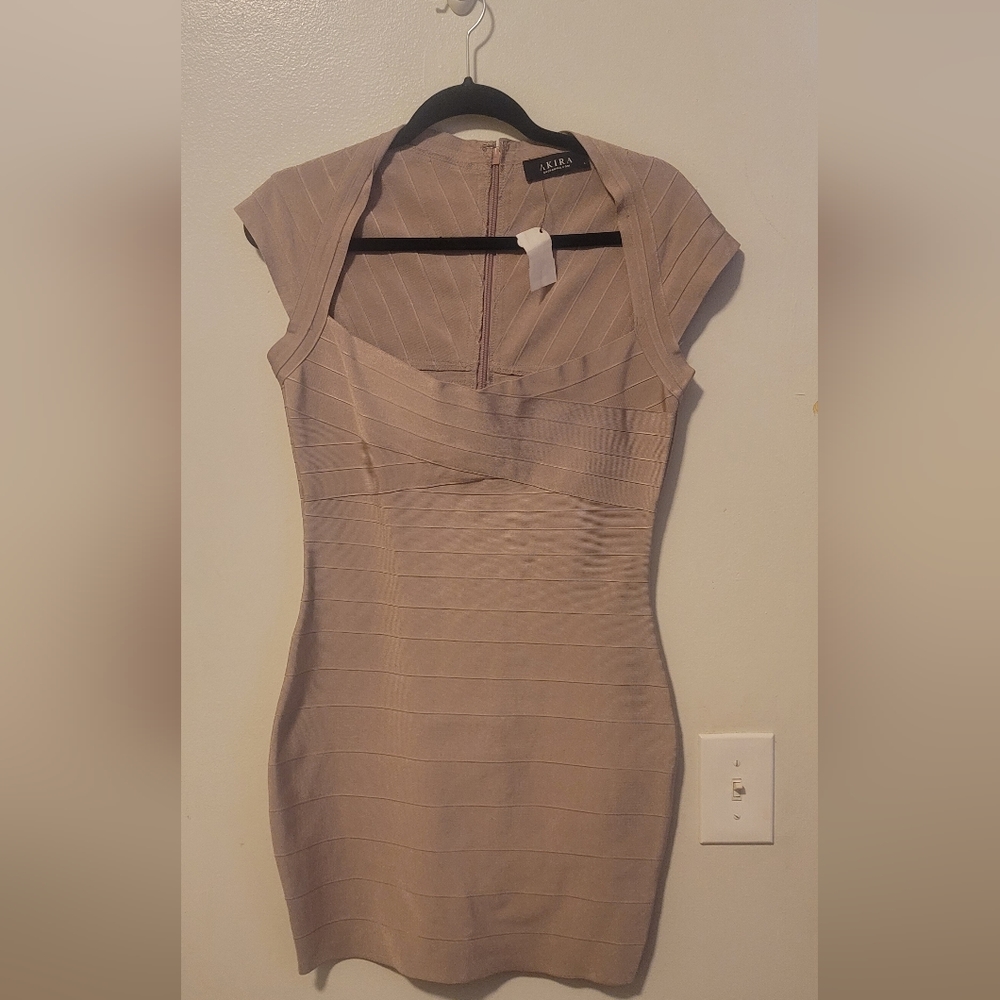 Form fitting dress, perfect for a wedding or date night.